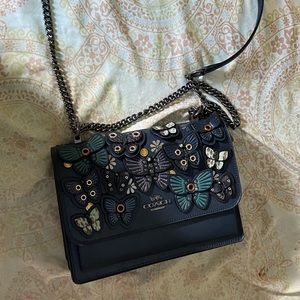 Blue flowery Coach bag with matching wallet